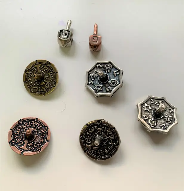 Ravada kanada Cast Metal Spinning Top