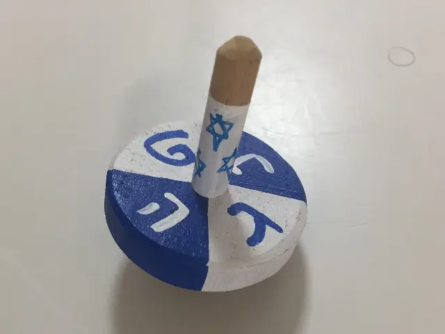 Spinning Tops Blue and White by Laura Lasker
