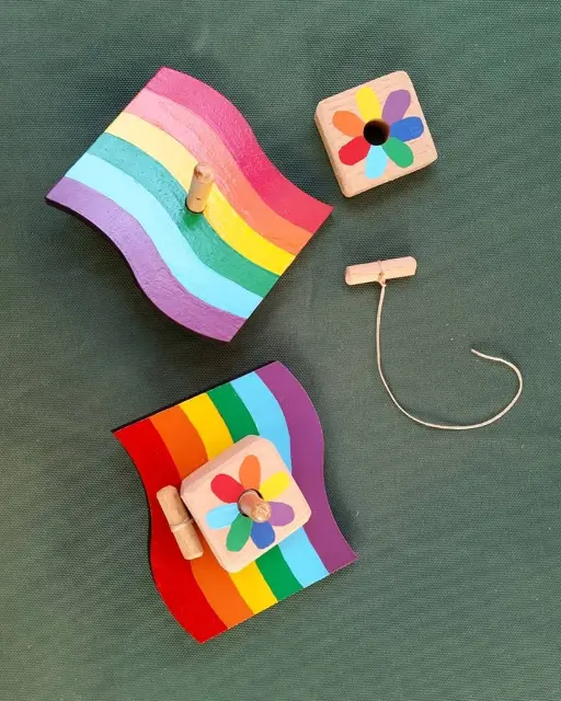 Spinning Tops LGBT Flag by Laura Lasker
