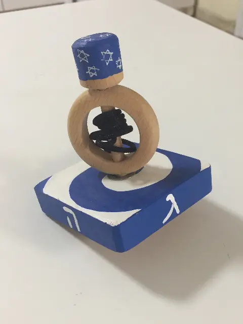 Spinning Tops with sending by Laura Lasker