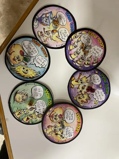 הסביבוני קריקטורה של קלאודיה מאשמאן