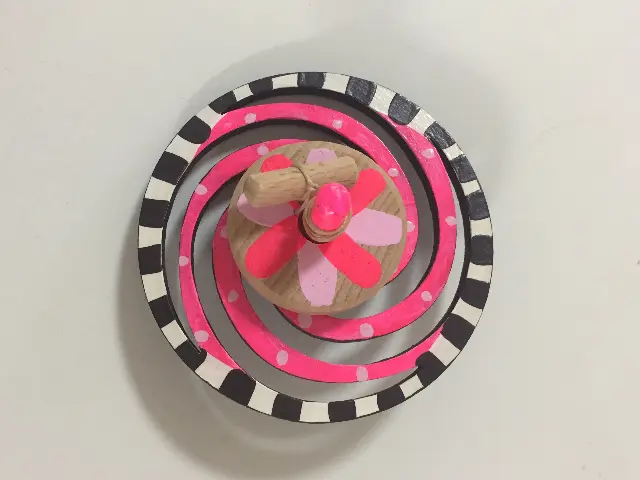 Spinning Tops Spiral by Laura Lasker