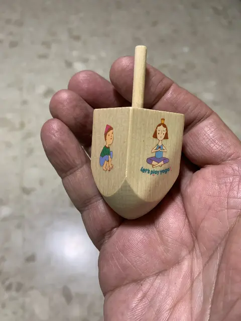 Yoga Spinning Top
