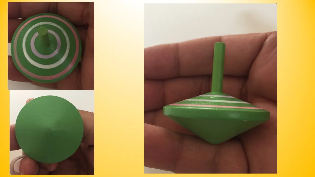 Green spinning top with white and pink circles, Hungary