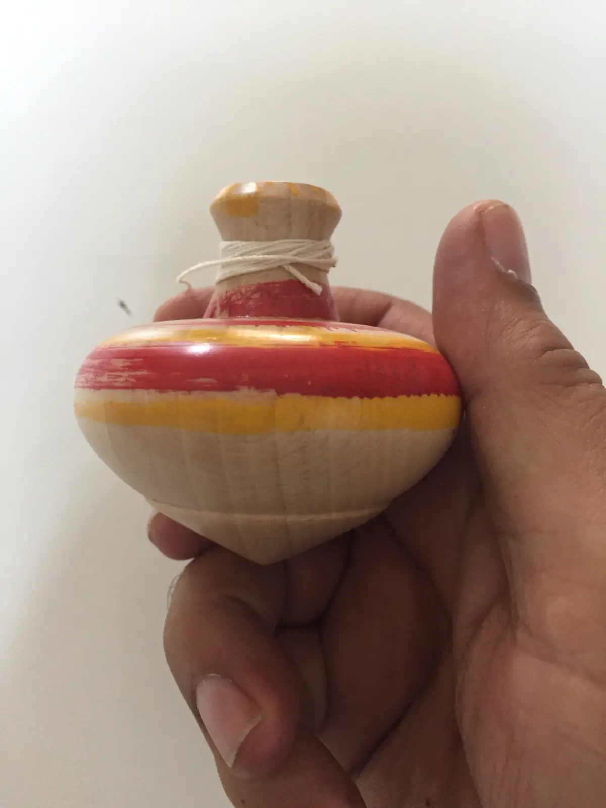 Spinning top with rod and string launcher from Budapest, Hungary