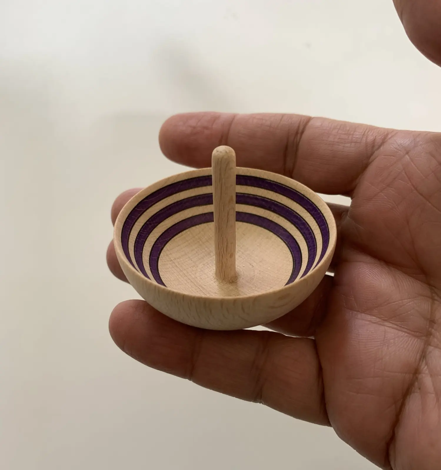 A cup-shaped spinning top made in Greece