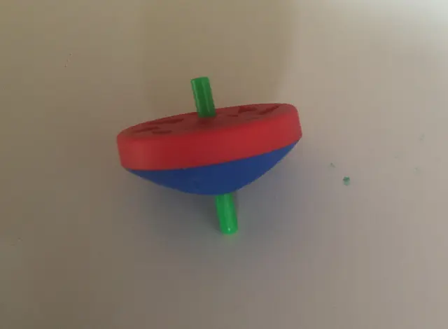 Japanese plastic KOMA spinning top (also eraser)