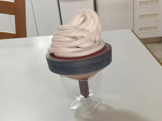 Green floor spinning top with spinning wire from Japan