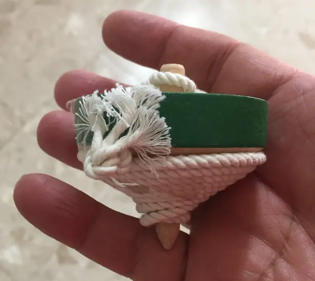 Green floor spinning top with spinning wire from Japan