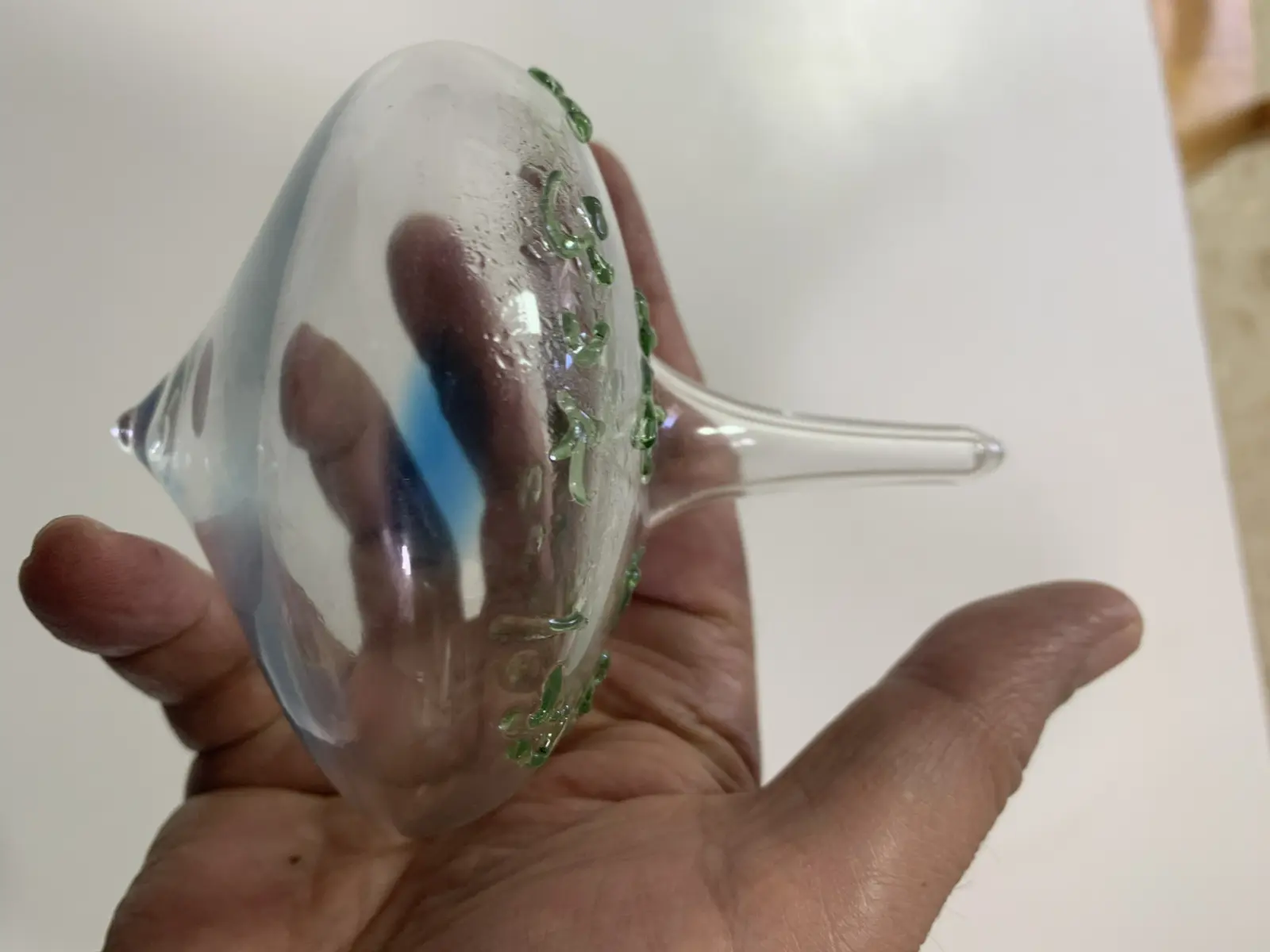 Glass spinning tops with blue liquid from the workshop of Yitzhak Cohen Arazi as part of the Chanukah activities of the Uri Foundation 2022
