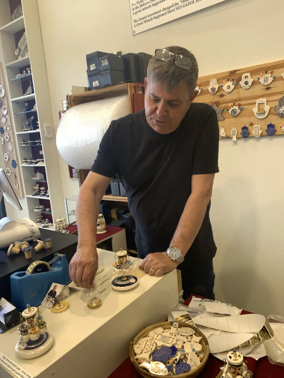 Hanukkah spinning top, ceramic glass and metal balls by Eran Graveler from the spinning top house