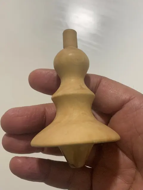 Olive wood engraving spinning top by Moshe Gazit