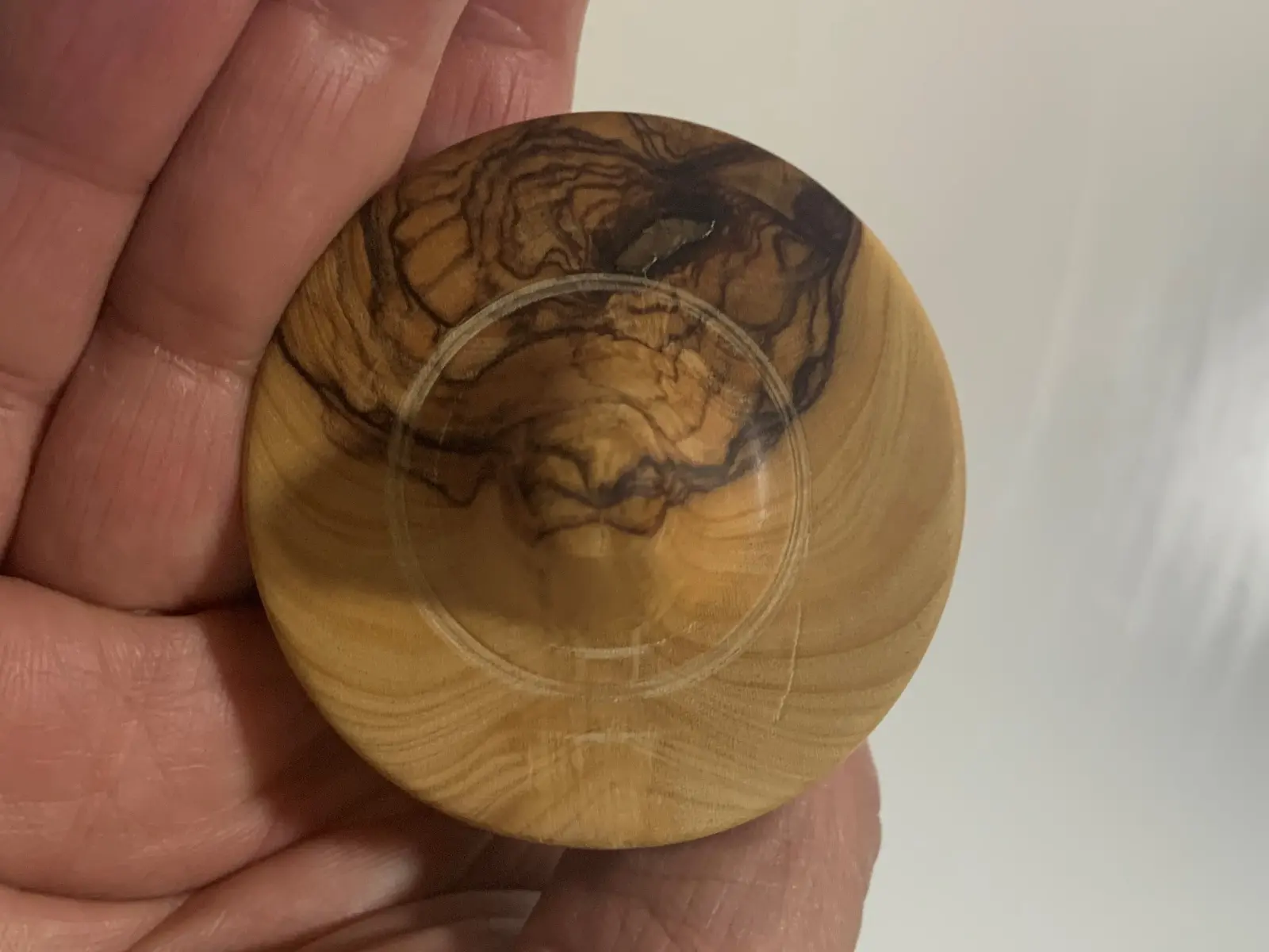 Olive wood engraving spinning top by Moshe Gazit