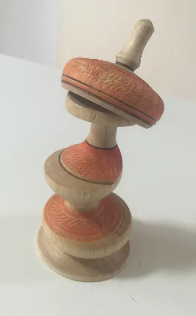 Pregnant Woman Spinning Top by Julian Ashkenazi
