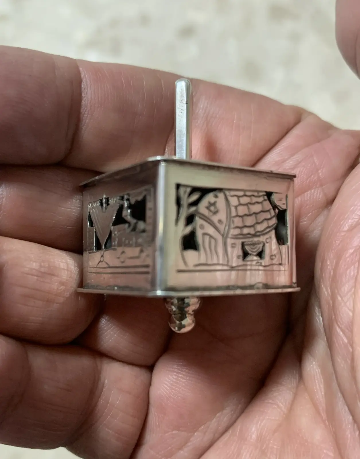 Spinning top from Oded Davidson's product label