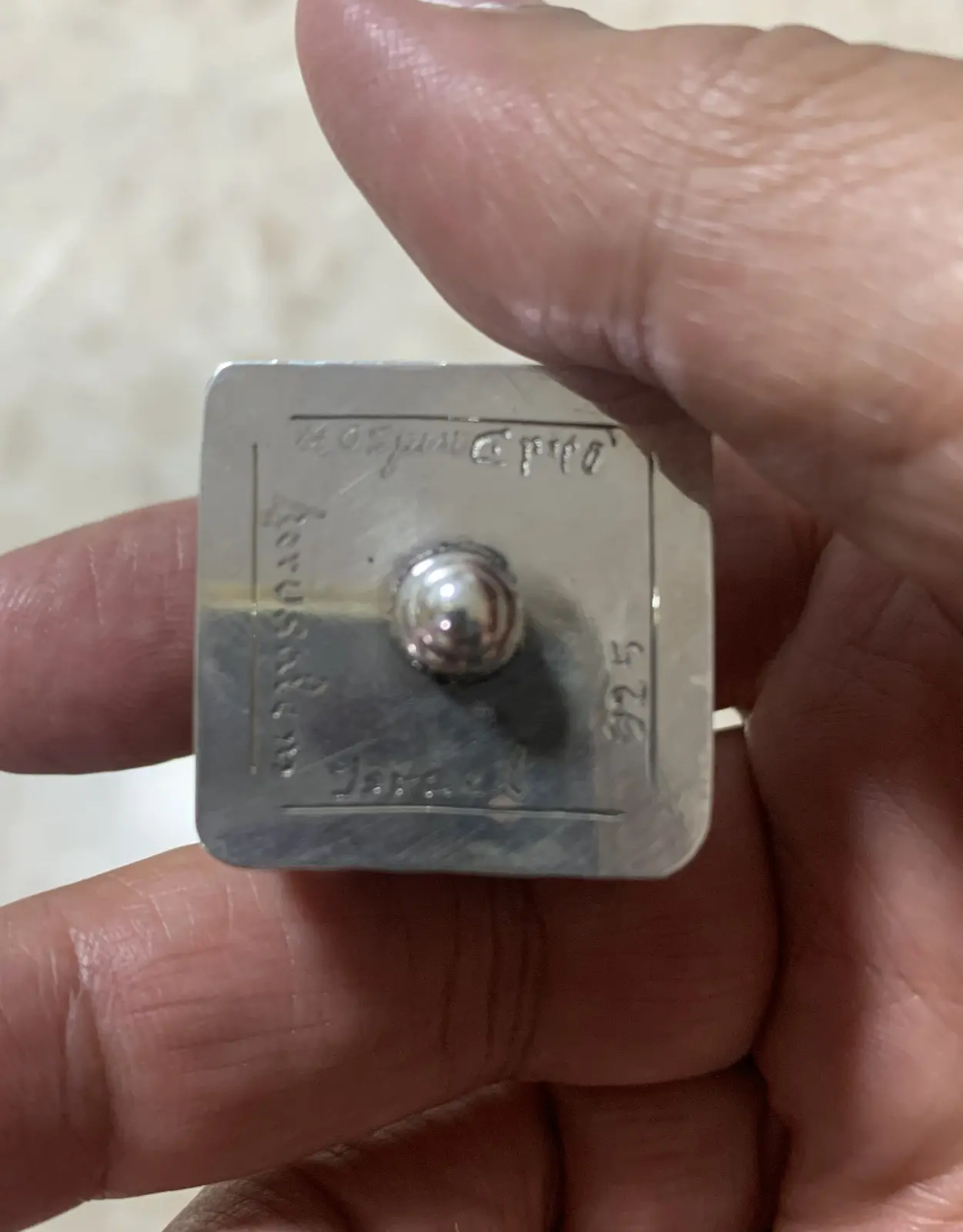 Spinning top from Oded Davidson's product label