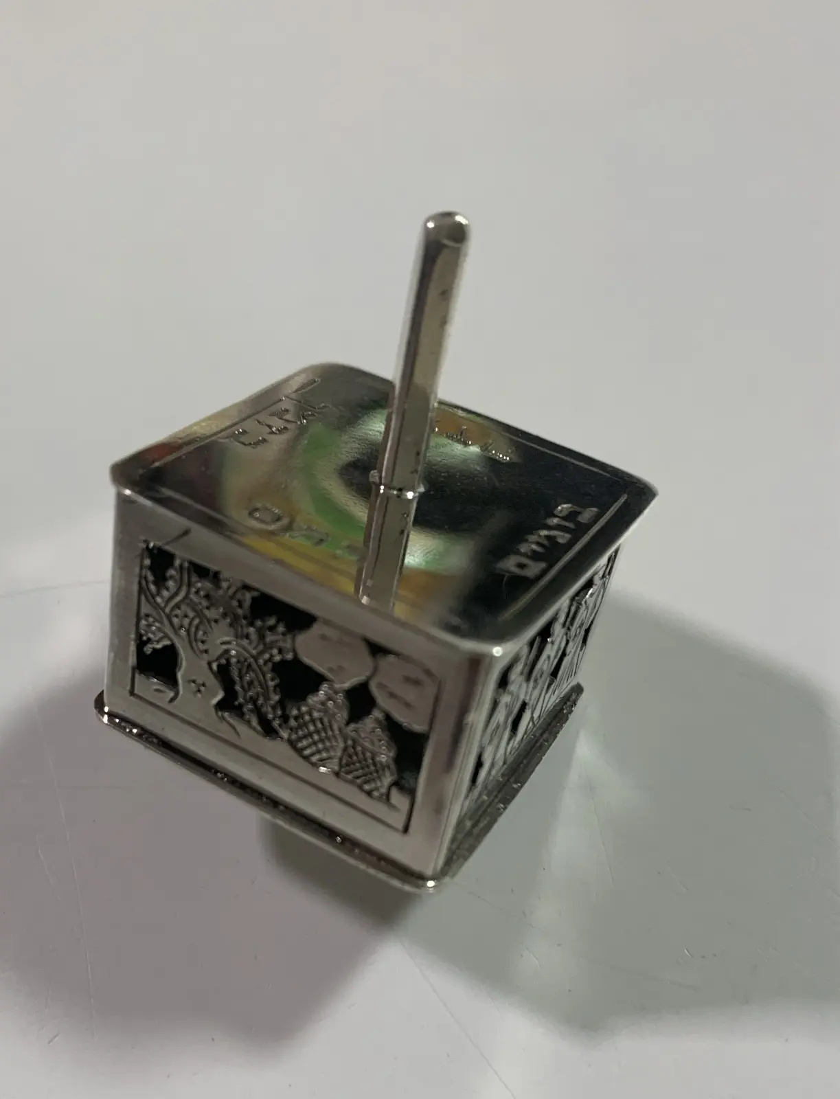 Spinning top from Oded Davidson's product label
